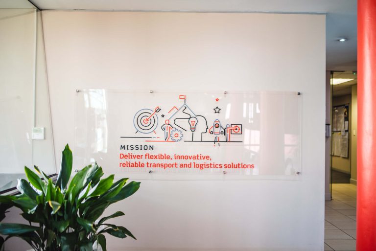 Aramex interior glass signage by Three6ixty