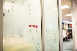 Aramex interior glass signage by Three6ixty