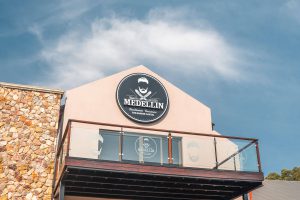 Medellin extrerior Signage by Three6ixty