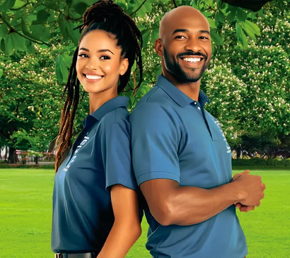 Male and female standing back-to-back, wearing navy-blue short-sleeve golf shirts.