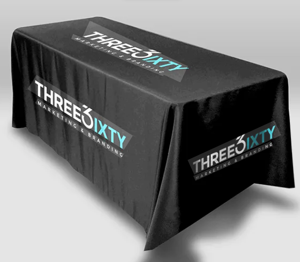 Corporate golf day branding with banners and flags displayed across a golf course event